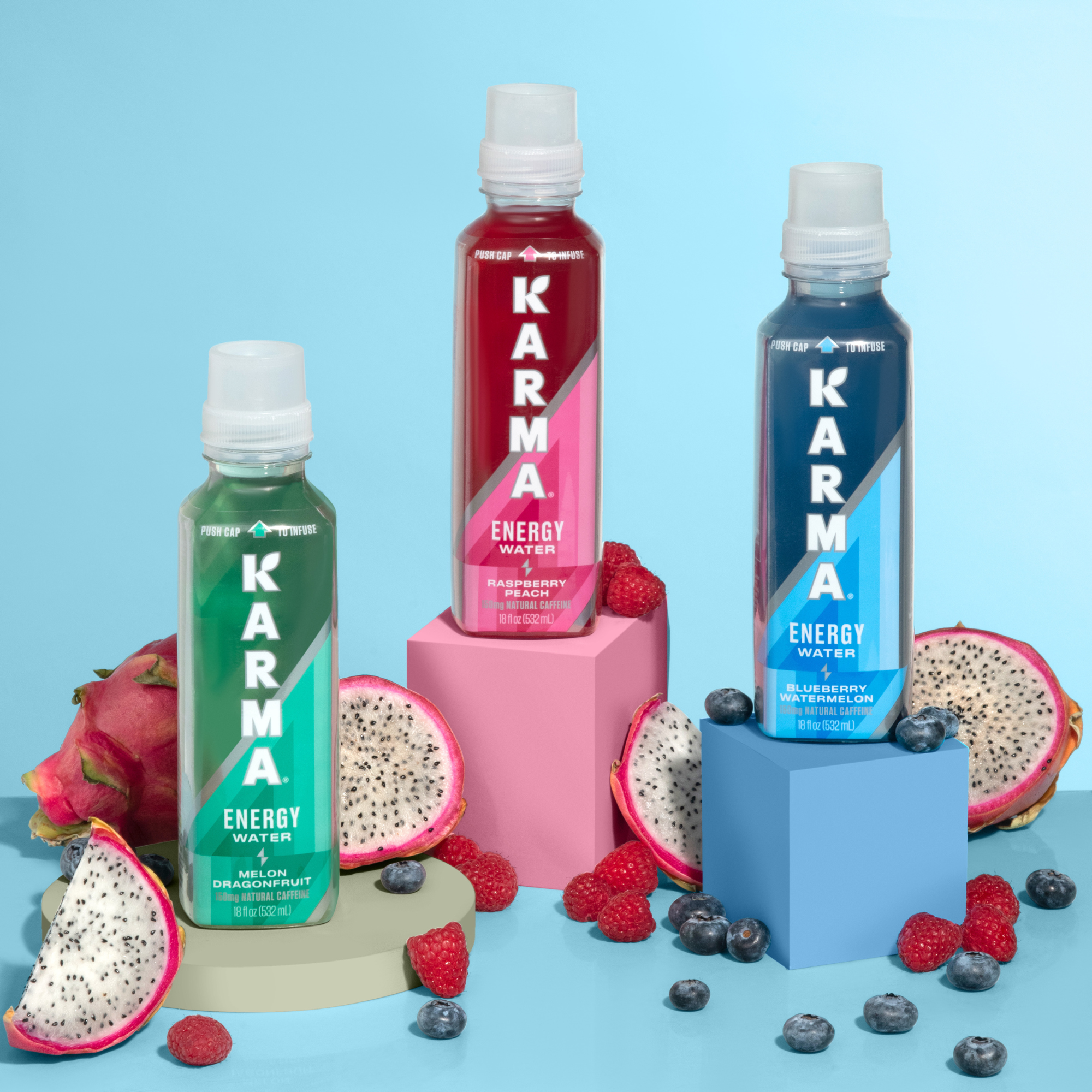 Studio shot of Karma Energy Water; Melon Dragonfruit, Raspberry Peach, and Blueberry Watermelon