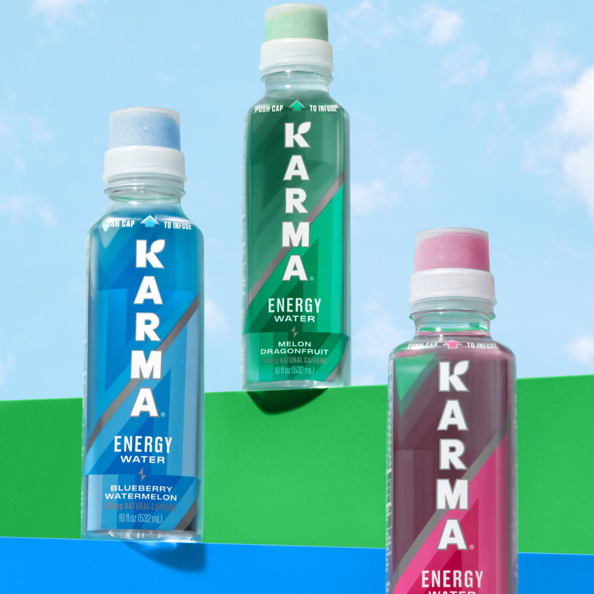 Studio shot of Karma Energy Water; Melon Dragonfruit, Raspberry Peach, and Blueberry Watermelon