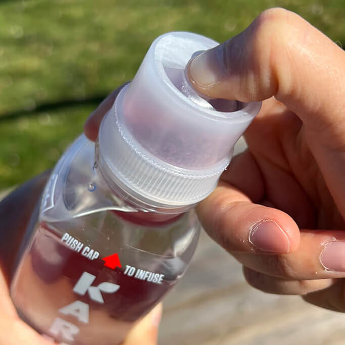 karma water bottle push